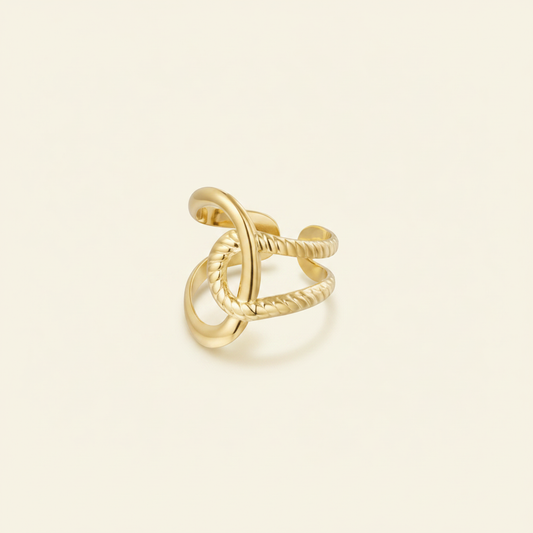 Velora Knot Ring on Glitzea’s warm ivory background